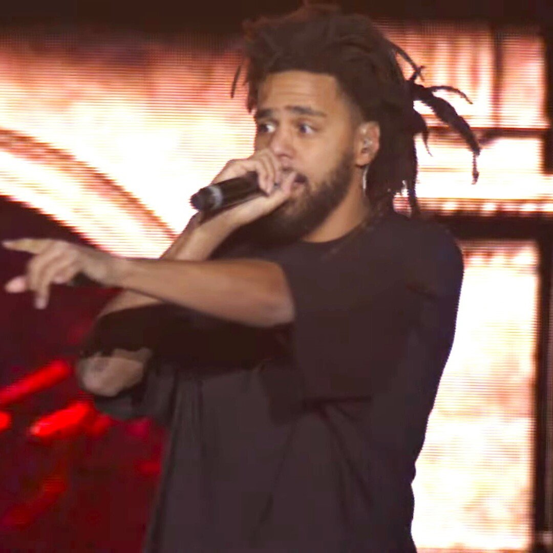 Publicity image of J. Cole